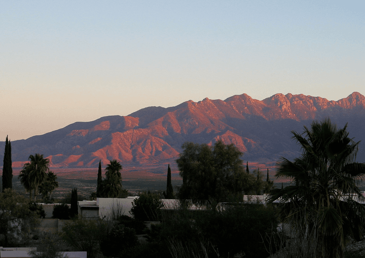 The Santa Rita Mountains at sunset over Green Valley