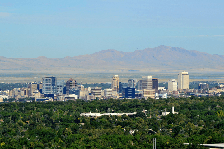 The Salt Lake City skyline with mountains behind it