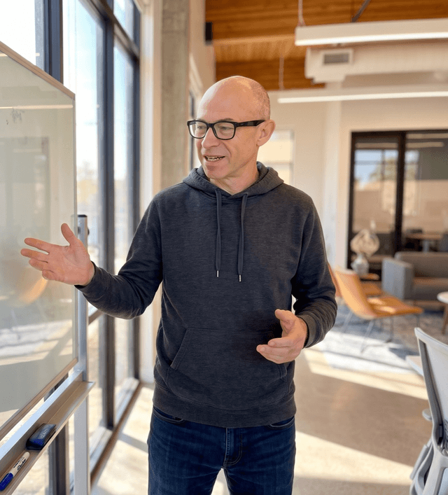 Jonathan Cavner, founder of Rincon AI, at a whiteboard